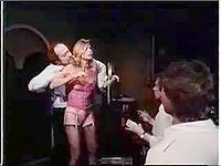 Susan Dey is struggling to be free while being held by a man from behind and down blousing her lingerie. Her supple boobs got exposed while the rest of the boys watching intently and wait to see more of her sexy body.